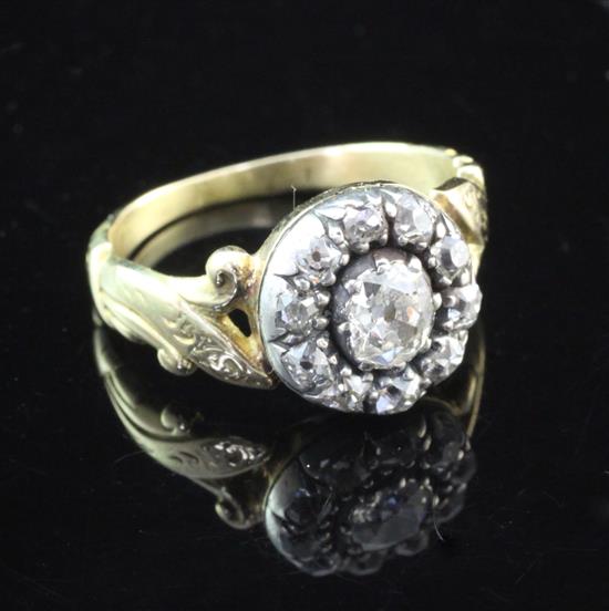 A 19th century gold and diamond cluster ring, size O.